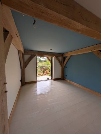 After Regal Touch Professional Decorating room hallway entrance painted in Weston-super-Mare Bristol wood columns beams floor refurbished redone